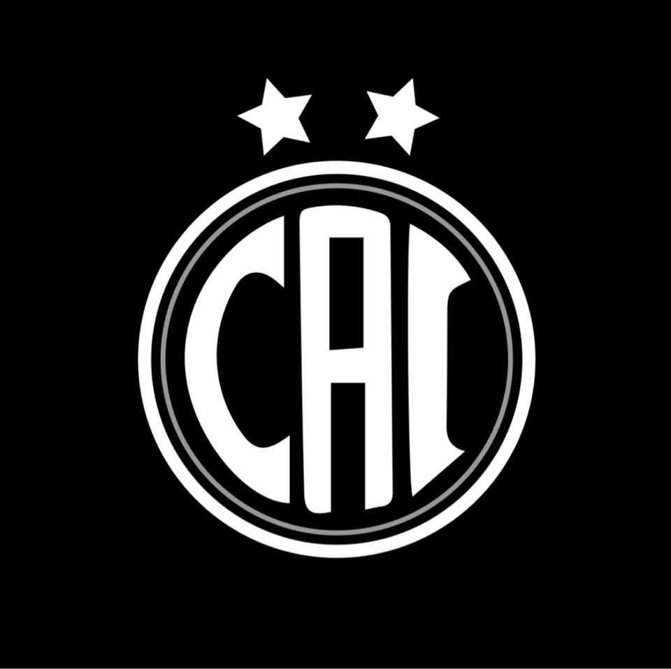 Escudo circular sobre fondo negro